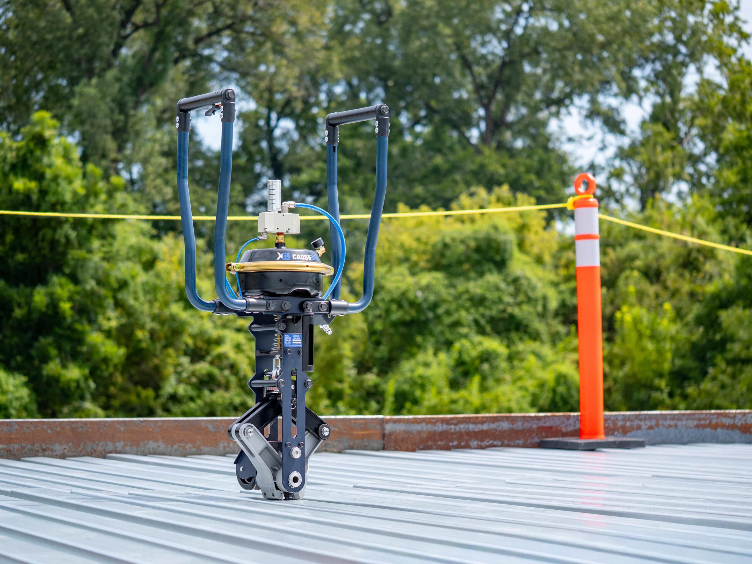 Crossbite side lap connection tool standing on a steel roof