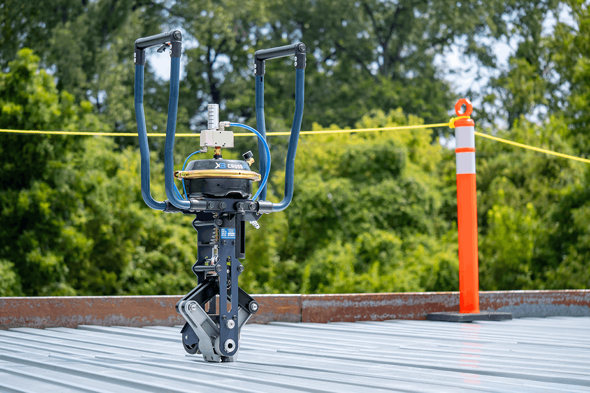 Crossbite side lap connection tool standing on a steel roof
